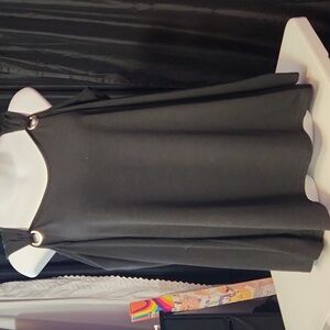 Elegant Black Longsleeve Top with Ring Accents